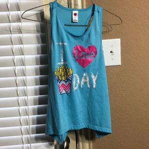 The shirt says I love Fridays